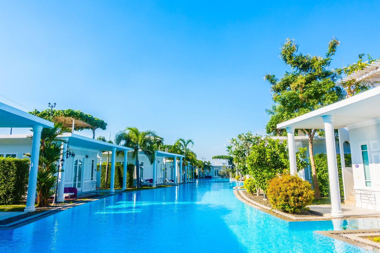 Beautiful luxury outdoor swimming pool in hotel pool resort - Boost up Color Processing